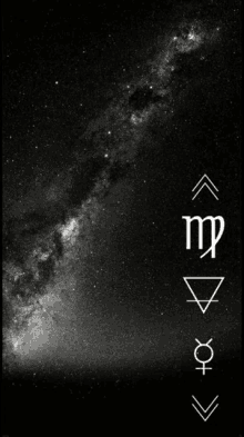 a black and white photo of the milky way with the letter m on the right