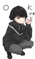 a boy in a black hoodie is squatting down and making a ok sign