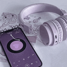 purple headphones next to a phone that says 13:14