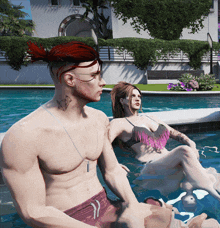 a man and a woman are sitting in a pool together