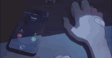 a phone with tsuki written on the screen