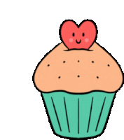 a cupcake with a heart on top has a smiling face on it