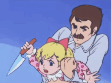 a man is holding a little girl with a knife in his hand