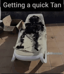 a picture of a person laying on a lounge chair with the caption " getting a quick tan "