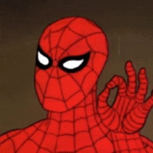 a close up of a cartoon spider man giving an ok sign .