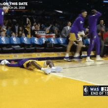 a basketball player is laying on the floor during a game on march 26th 2019