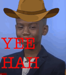 a young boy wearing a cowboy hat with yee hah written in red