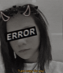 a black and white photo of a girl with a sticker on her face that says error