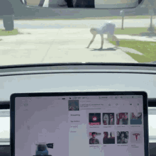 a tesla model 3 dashboard with a screen that says streaming