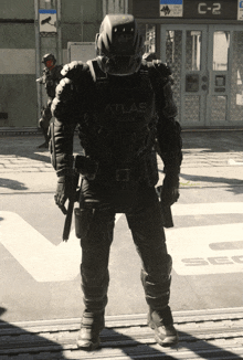 a black and white photo of a soldier with the word atlas on his uniform