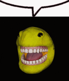 a close up of a yellow face with a speech bubble above it