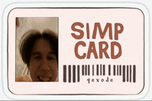 a simp card with a picture of a smiling man on it