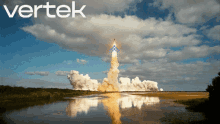 a picture of a rocket being launched with vertek written on the top