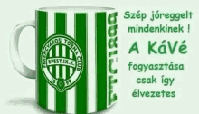 a green and white striped mug with a foreign language message on it