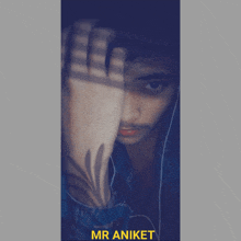 a picture of a man with the name mr aniket on the bottom right