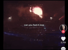 a video of a concert with the words " can you feel it now "