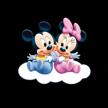 baby mickey and minnie mouse sitting on a cloud