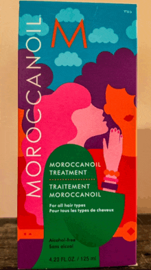 a box of moroccanoil treatment with a woman on the front