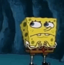 spongebob squarepants is making a sad face while standing in front of a cave .