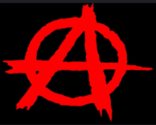 a red anarchy symbol with a cross in the middle on a black background