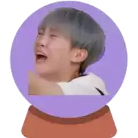 a man with gray hair is laughing in a purple circle