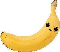 a yellow banana with two black crosses on it 's face