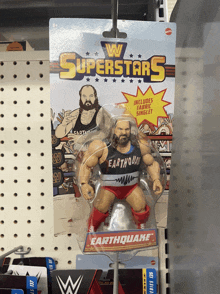 a w superstars earthquake action figure is displayed in a store