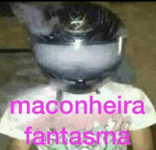 a person wearing a helmet with smoke coming out of it and the words maconheira fantasma .