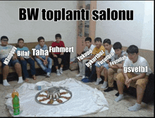 a group of boys sitting on a couch with the words bw toplanti salonu on the top