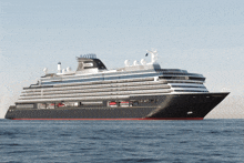 a large cruise ship is floating in the ocean and has the name indiana on the side