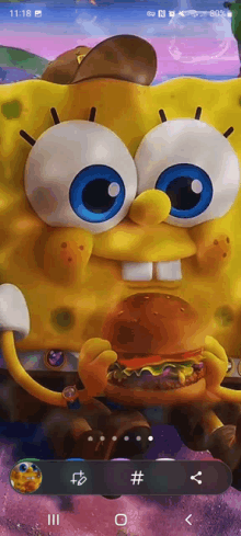 a phone screen shows a cartoon character eating a hamburger