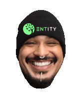 a man wearing a black beanie that says entity