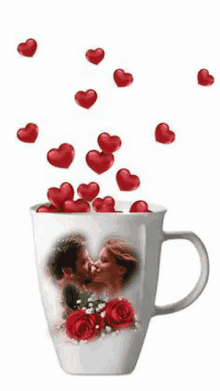 a cup with a picture of a man and a woman kissing on it and hearts falling out of it .