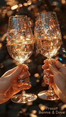 two people toasting with champagne glasses that say proost bennie & dinie on the bottom