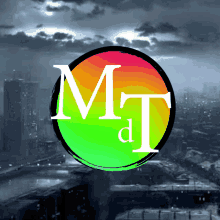 a colorful circle with the letter m and t inside