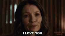 a woman says " i love you " in a close up of her face