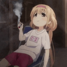 a girl is sitting in a chair smoking a cigarette and smoke is coming out of her mouth .