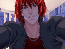 a man with red hair is wearing a black jacket