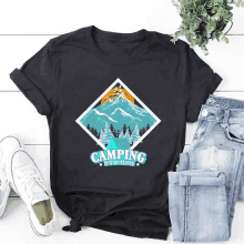 a black t-shirt that says camping it 's in tents on it