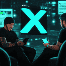 two men are sitting in front of a large x on a screen