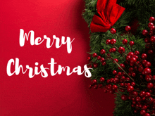 a red background with the words merry christmas and a christmas wreath