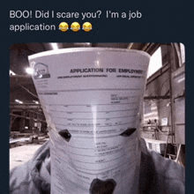 a cup with an application for employment printed on it