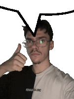 a man wearing glasses is giving a thumbs up and has a black and white shirt on