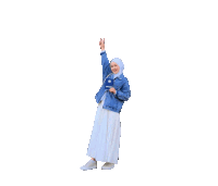 a woman wearing a hijab and a denim jacket holds up her hand