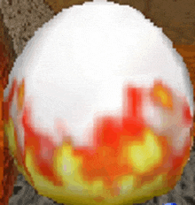 a pixel art of a candy corn with red and yellow flames .