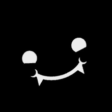 a white smiley face with vampire teeth on a black background