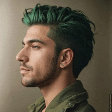 a man with green hair is wearing earrings and a green shirt