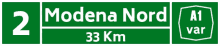 a green sign that says modena nord and 33 km