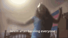 a blurry picture of a person dancing with the words keem after banning everyone