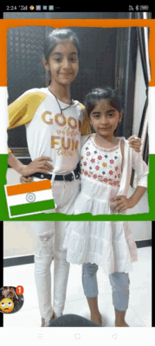 two girls are posing for a picture and one has a shirt that says good vibes fun times